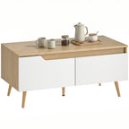 Table basse Aino en chêne clair et blanc avec deux tiroirs, vue de face sur fond blanc