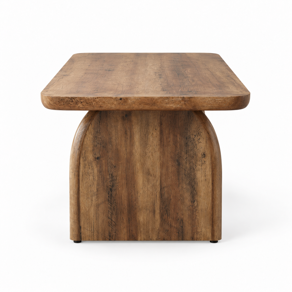 Table basse Haldor vue de face sur fond blanc, plateau arrondi et pied courbé