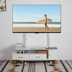Support TV sur pied blanc installé derrière un meuble bas